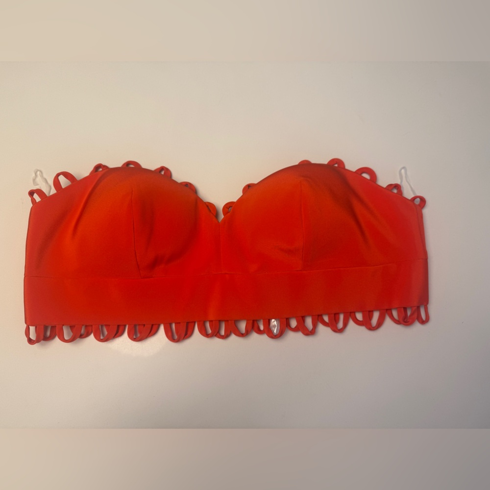 Elegant Orange Strapless Crop Top with Loop Trim.